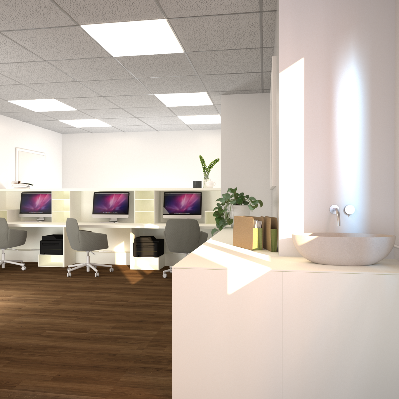 Moderne Büroumgebung mit Computern, Pflanzen und einem Waschbecken.